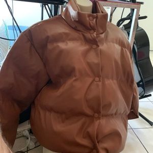 Brand new A new day cognac leather puffer. It is faux. Size large.